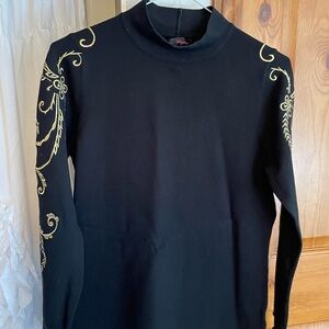 Chic Black Turtleneck Sweater with Gold Accents